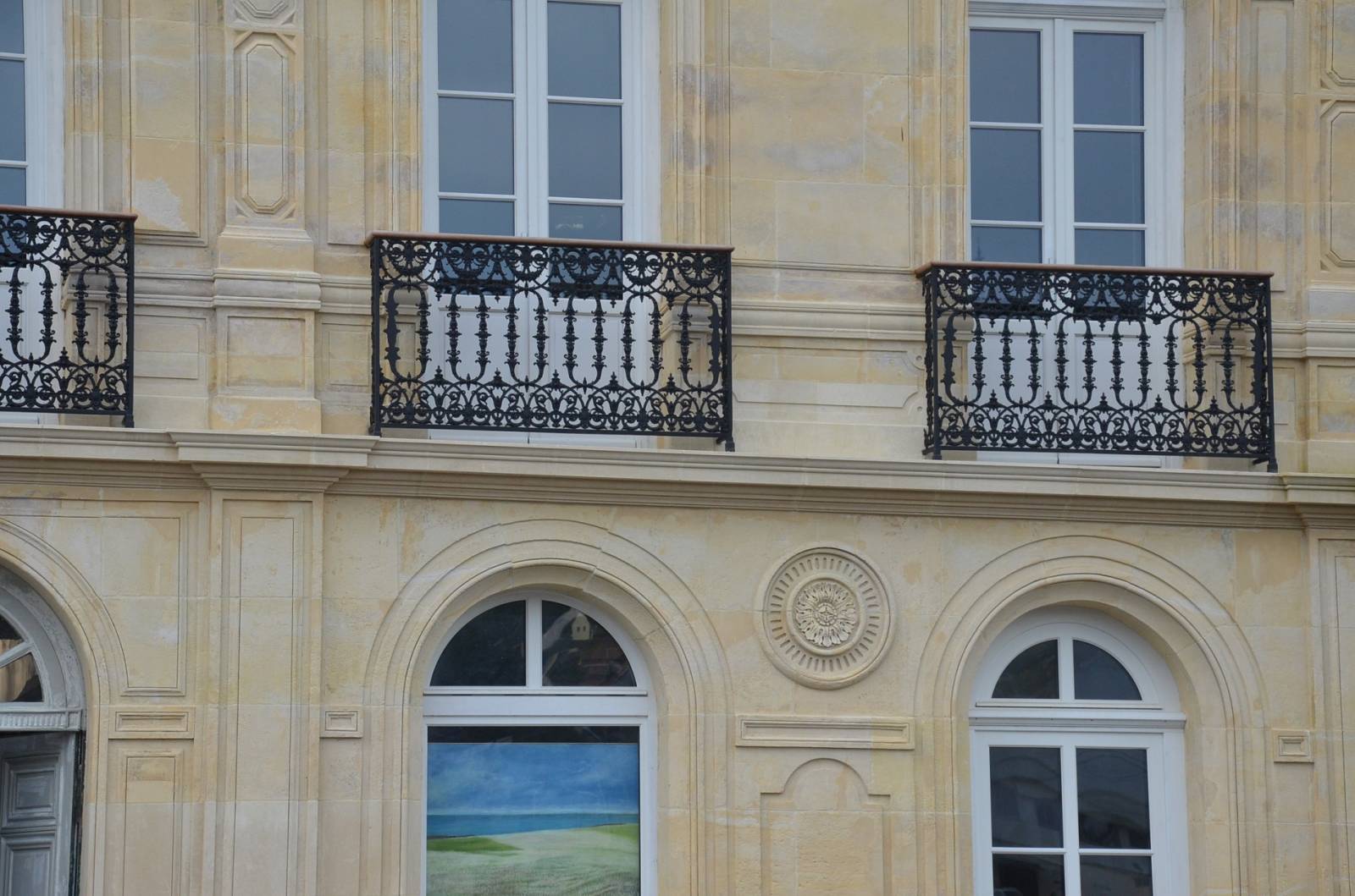 Restauration de la façade en pierre d'une maison bourgeoise à Fécamp