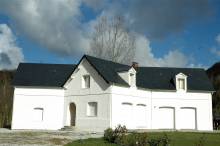 Réalisation des façades en pierre de taille sur une maison neuve proche Etretat