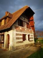 Restauration des façades en briques, silex et pierre, d'une longère proche d'Etretat