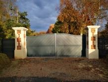 Réalisation de deux piliers en briques et pierre proche Goderville