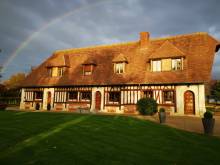 Restauration des façades en briques, silex et pierre, d'une longère proche d'Etretat